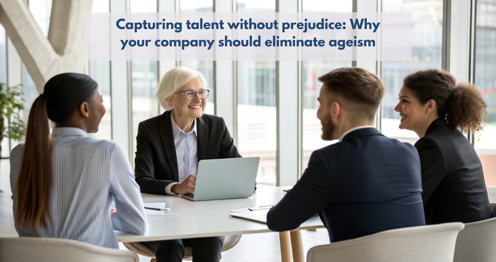 Senior professional in a job interview with a diverse team. Generational inclusion and senior talent.